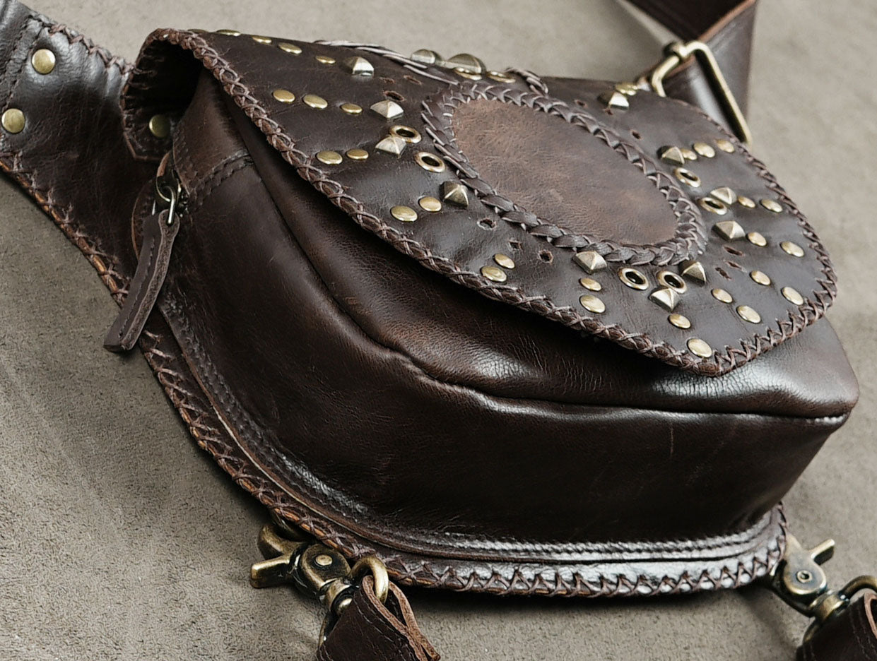 Dark brown leather hip pouch with decorative brass stud detailing