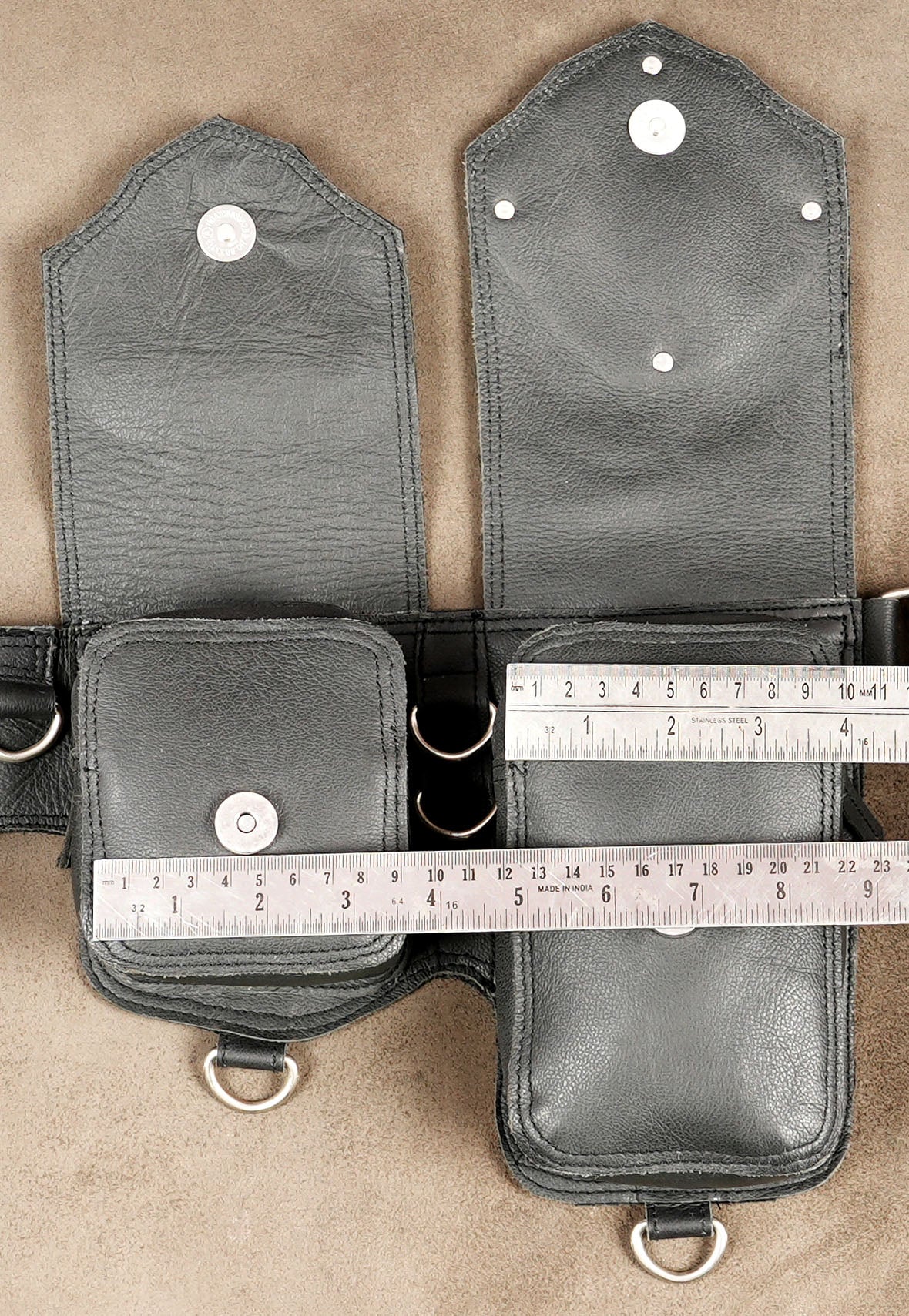 Dark fantasy leather belt, front flat lay view