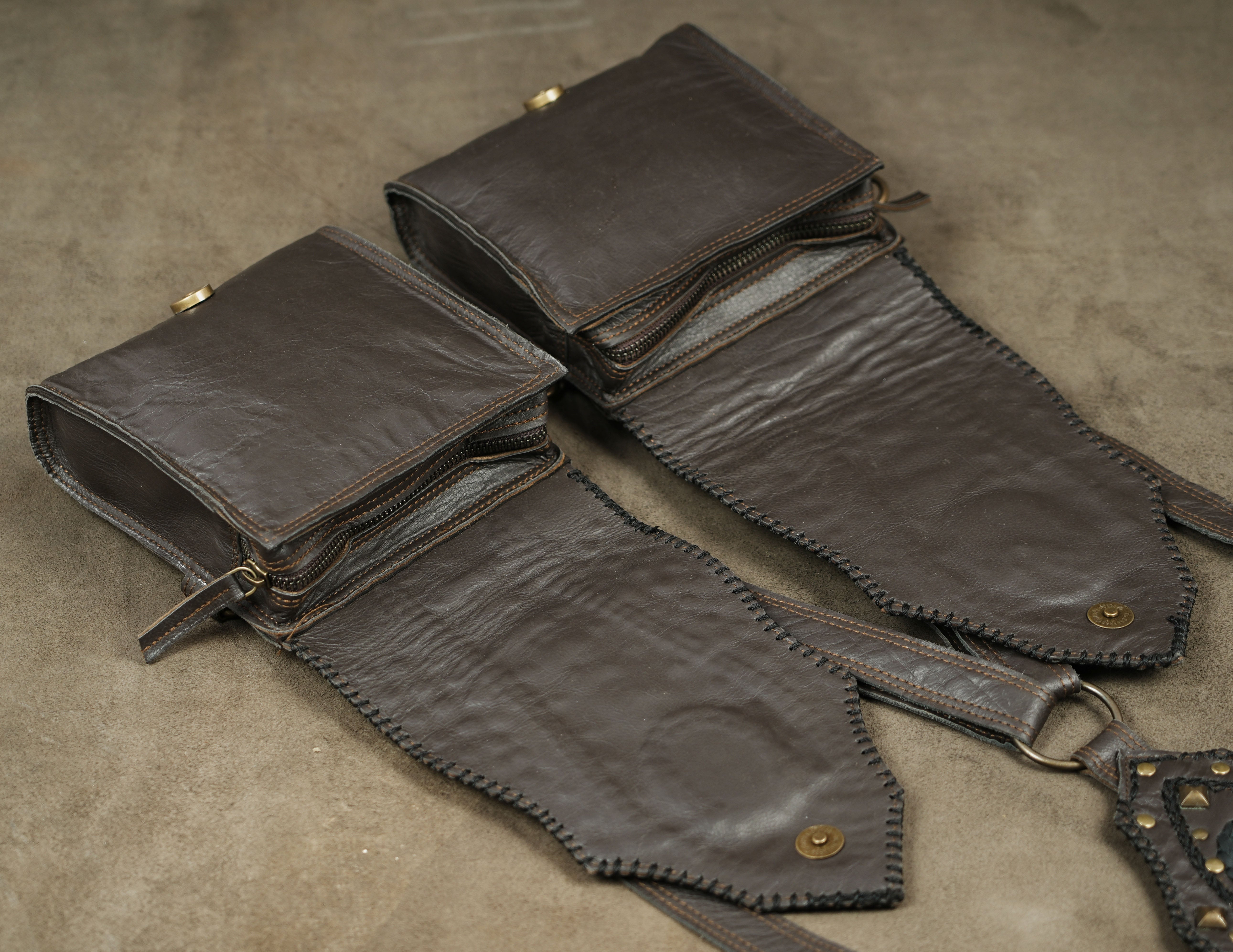 Dark fantasy leather harness, front flat lay view