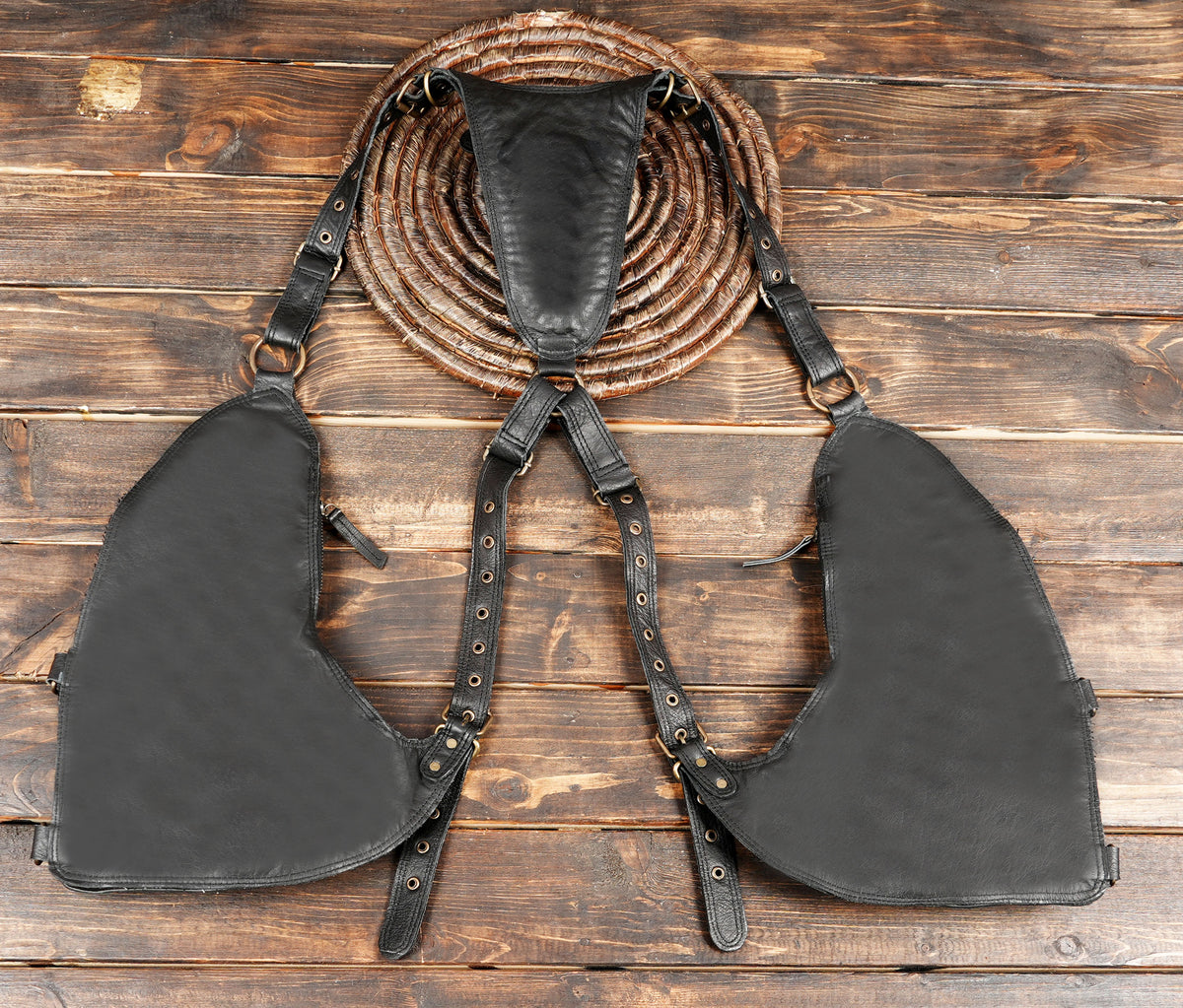 Leather shoulder bag harness with adjustable straps and metal buckles