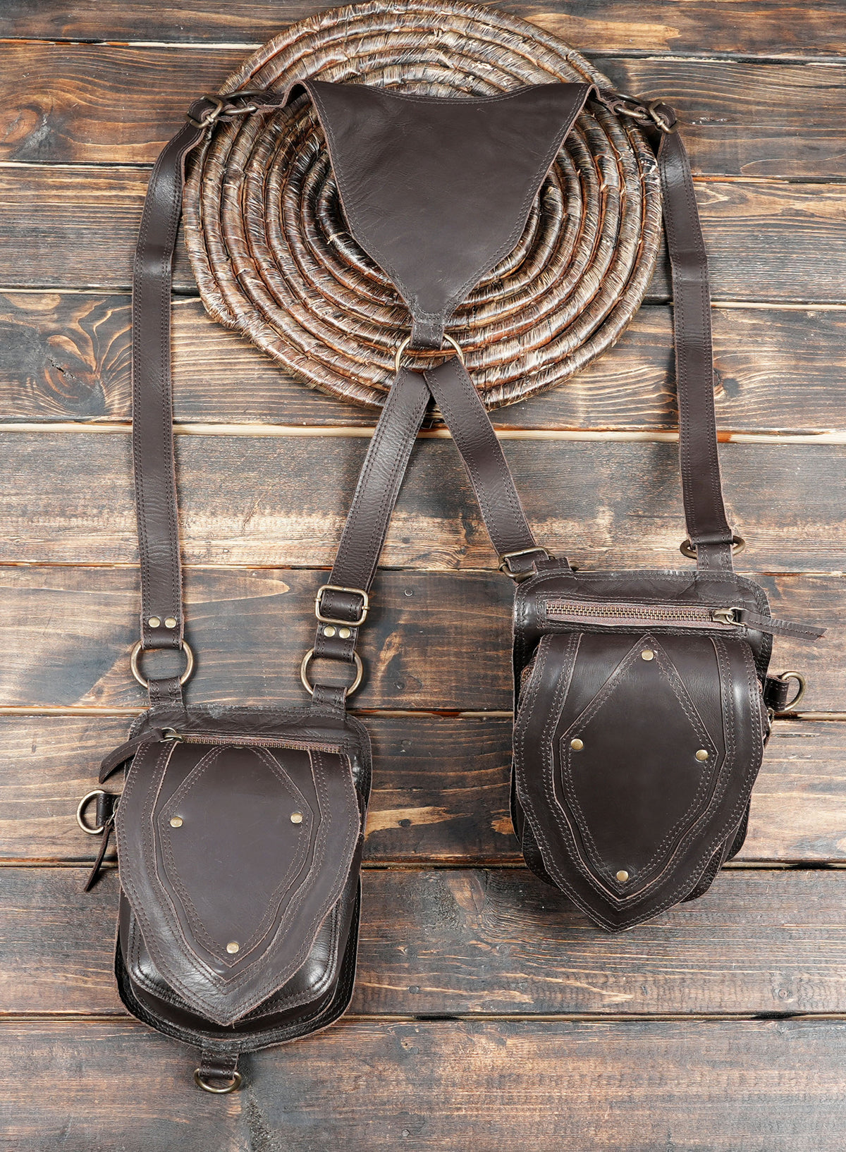 Dark brown leather utility harness with two spacious holster style pockets
