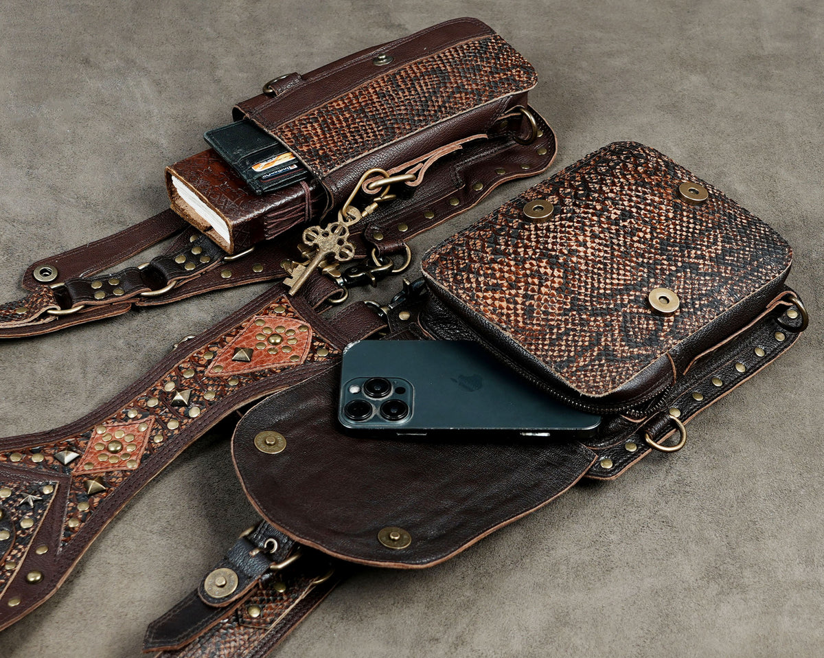 Leather shoulder bag holster with adjustable straps and multiple storage compartments.