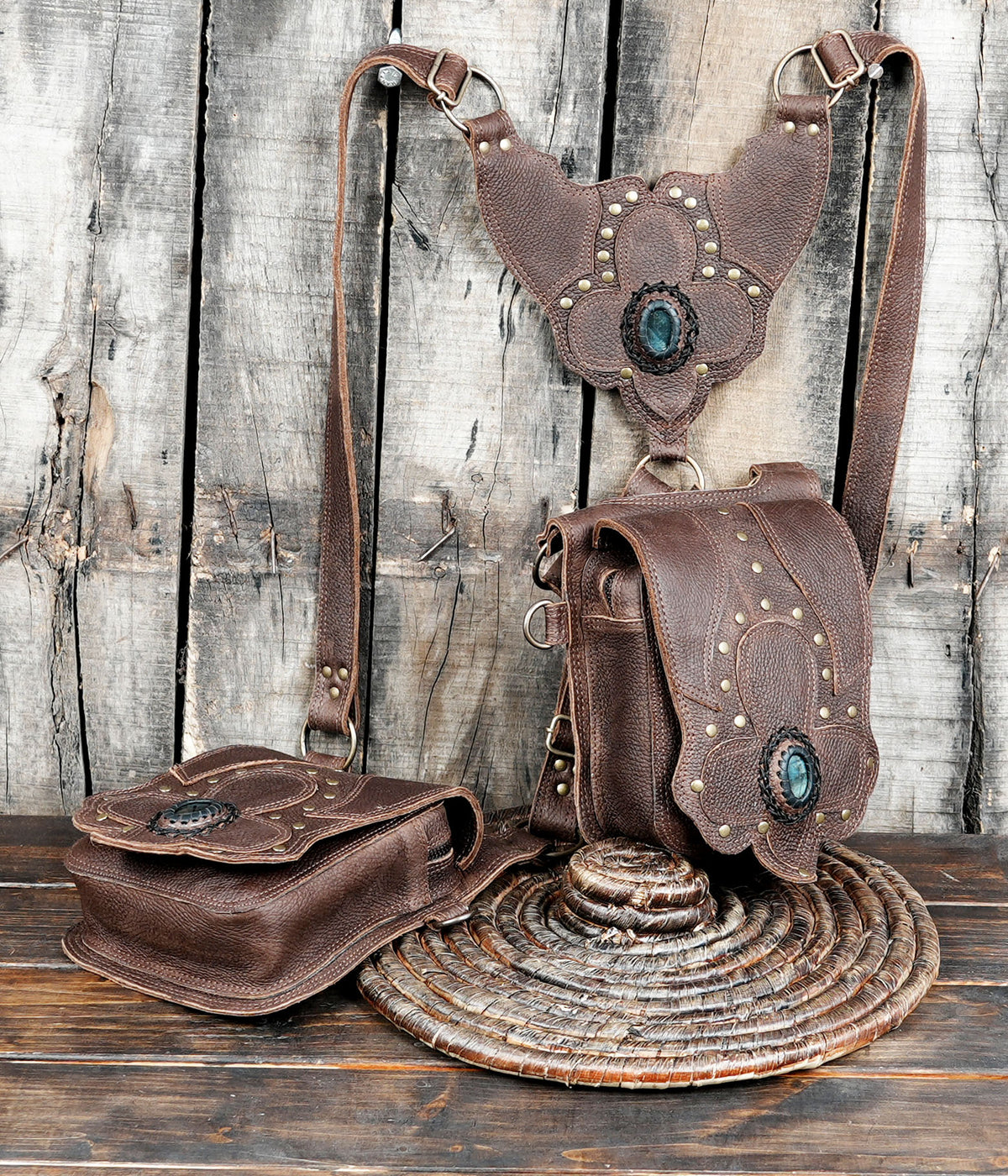 Brown leather crossbody harness bag with natural stone embellishments