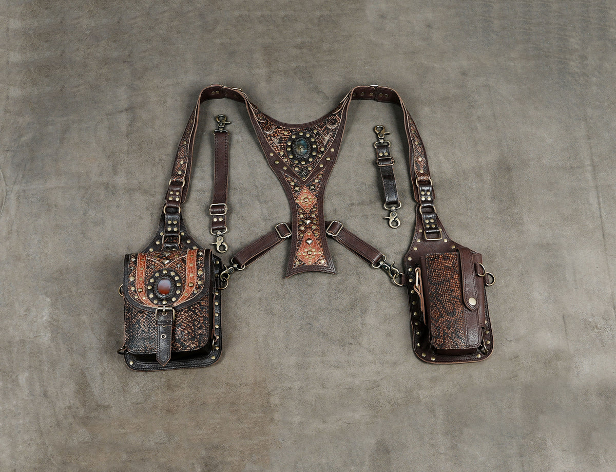 Handmade steampunk leather harness with decorative copper-tone accents and utility pouches.