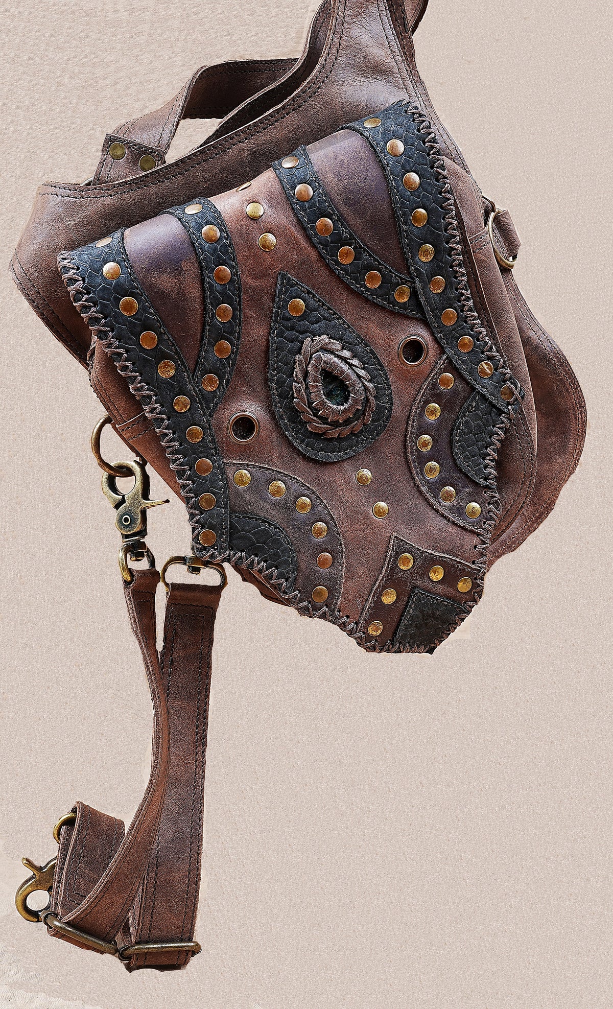 Alternative fashion leather harness with matching pouches and handcrafted details