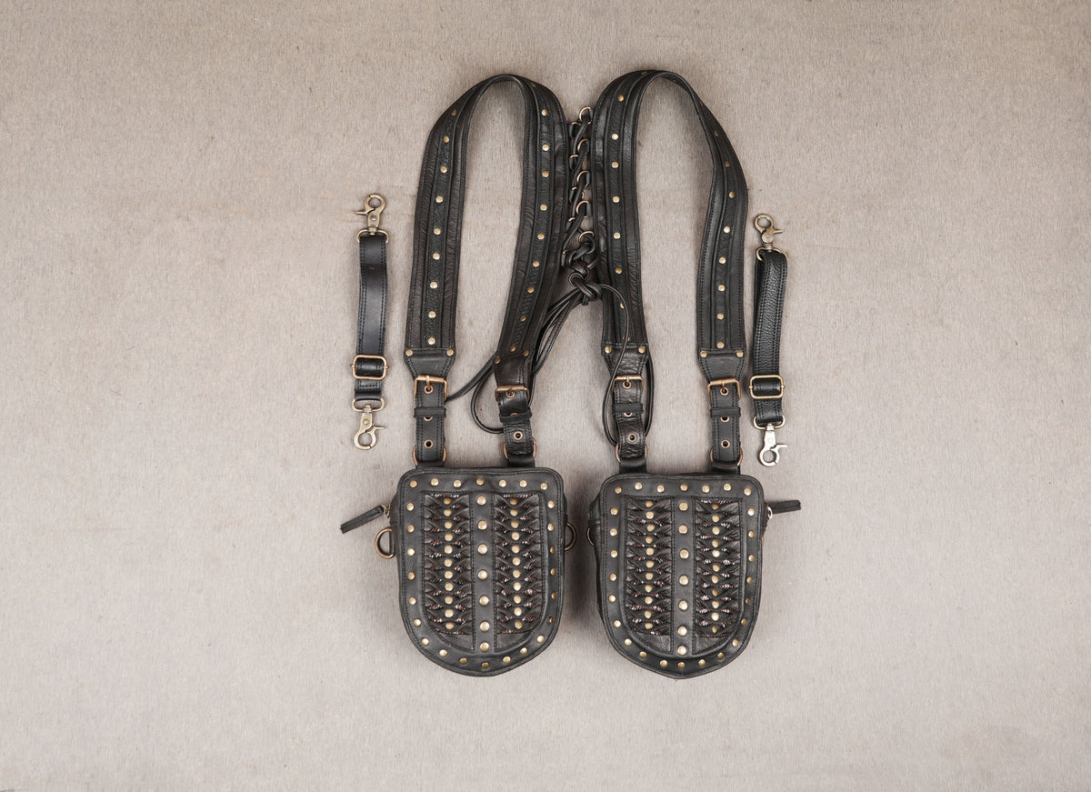 Unisex black leather leg harness with decorative brass studs and buckle straps