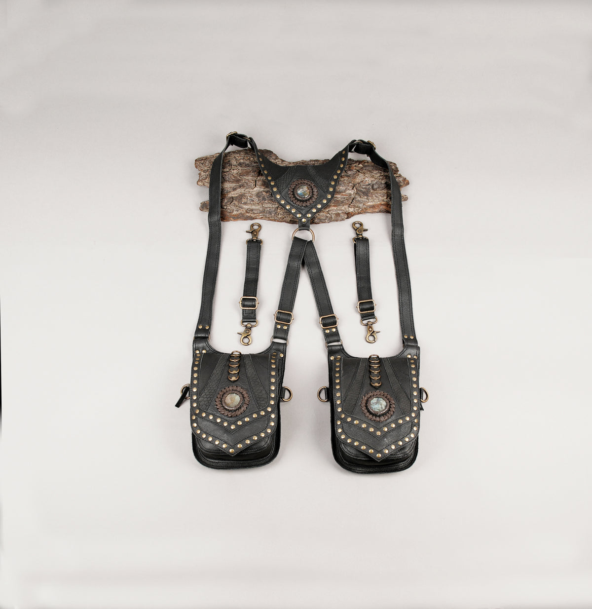 Unisex black leather double pocket harness bag with gemstone details