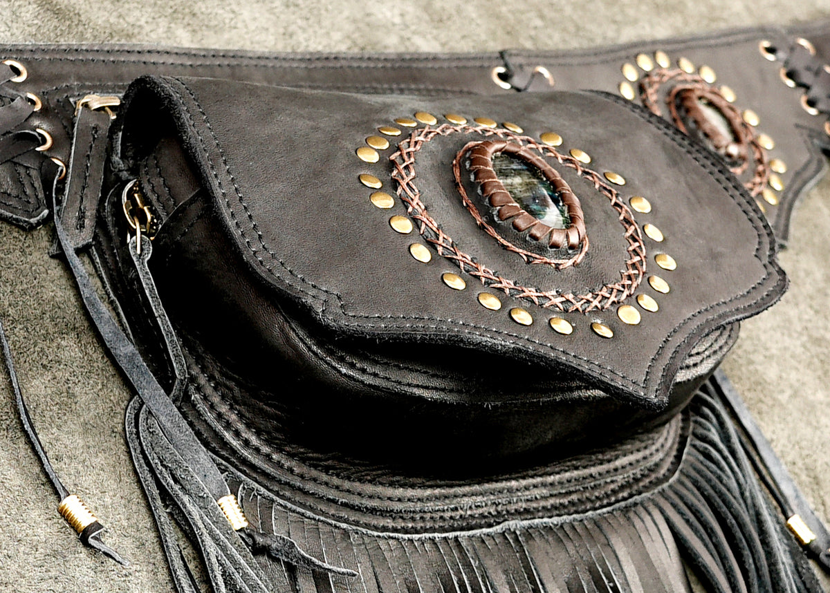Black handmade leather belt bag with fringe tassels and stone embellishments
