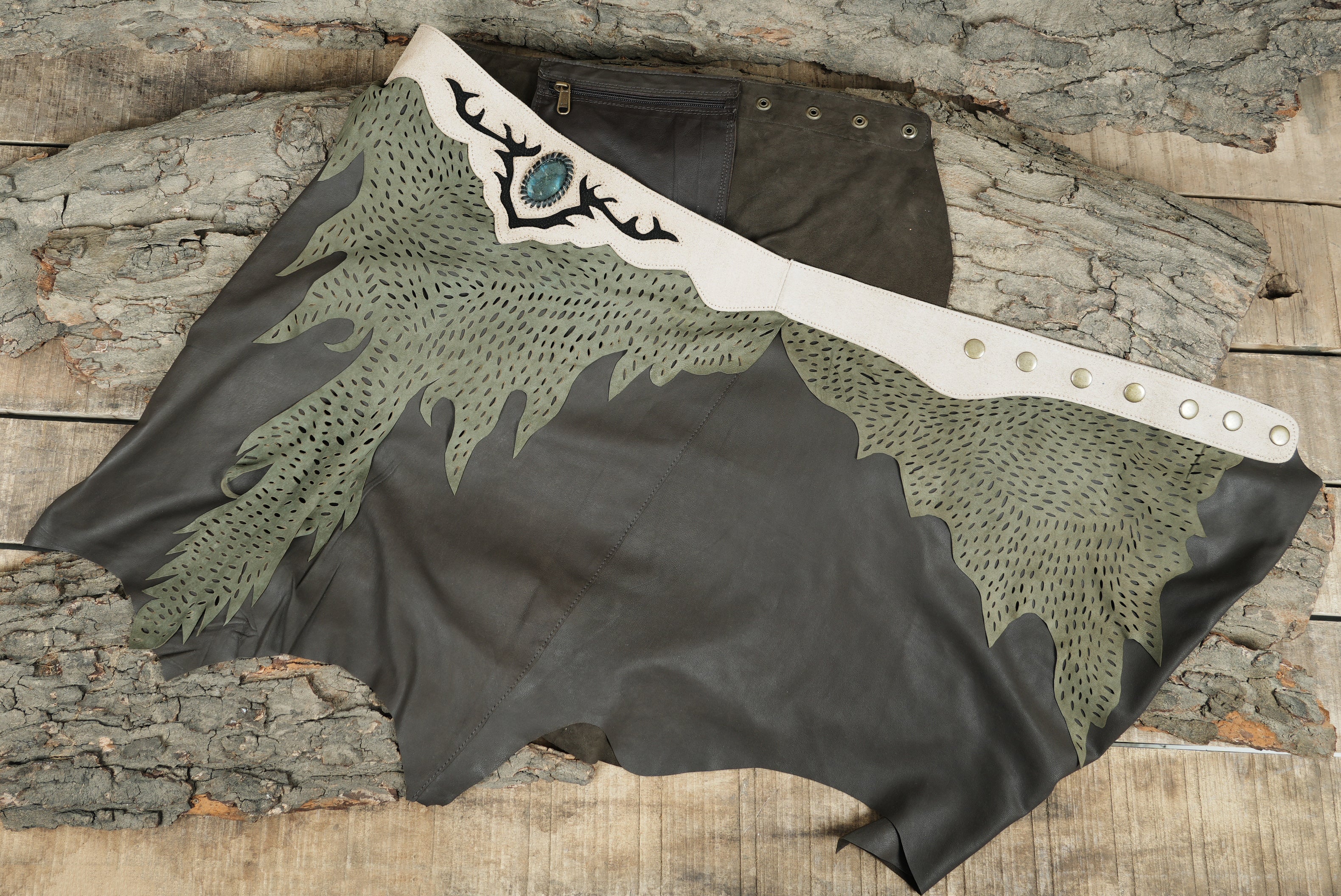 Druid costume leather skirt styled on tree bark background