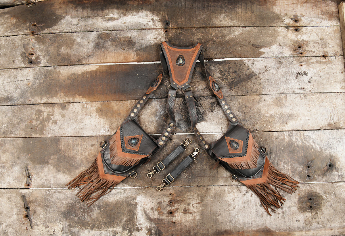 Black and brown leather double hip holster harness with stone accents and fringe