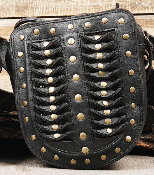 Unisex gothic leg harness with black leather panels and antique brass details