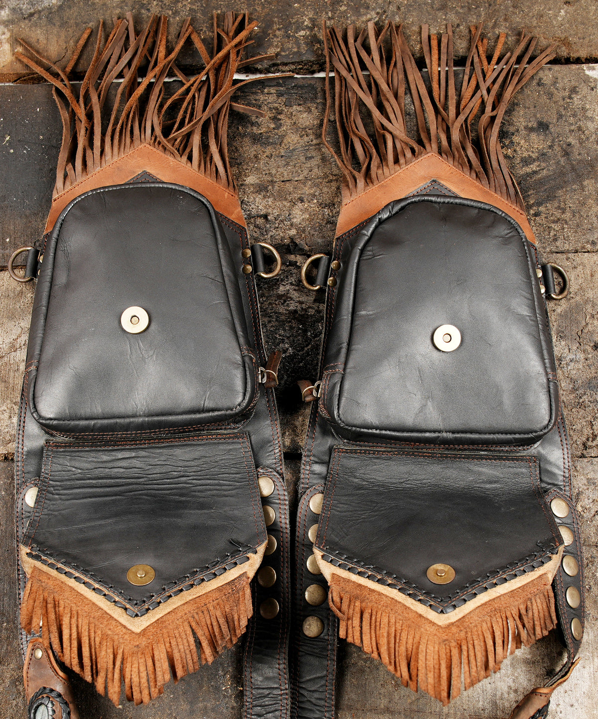 Leather hip harness with blue green iridescent stone accents and decorative stitching