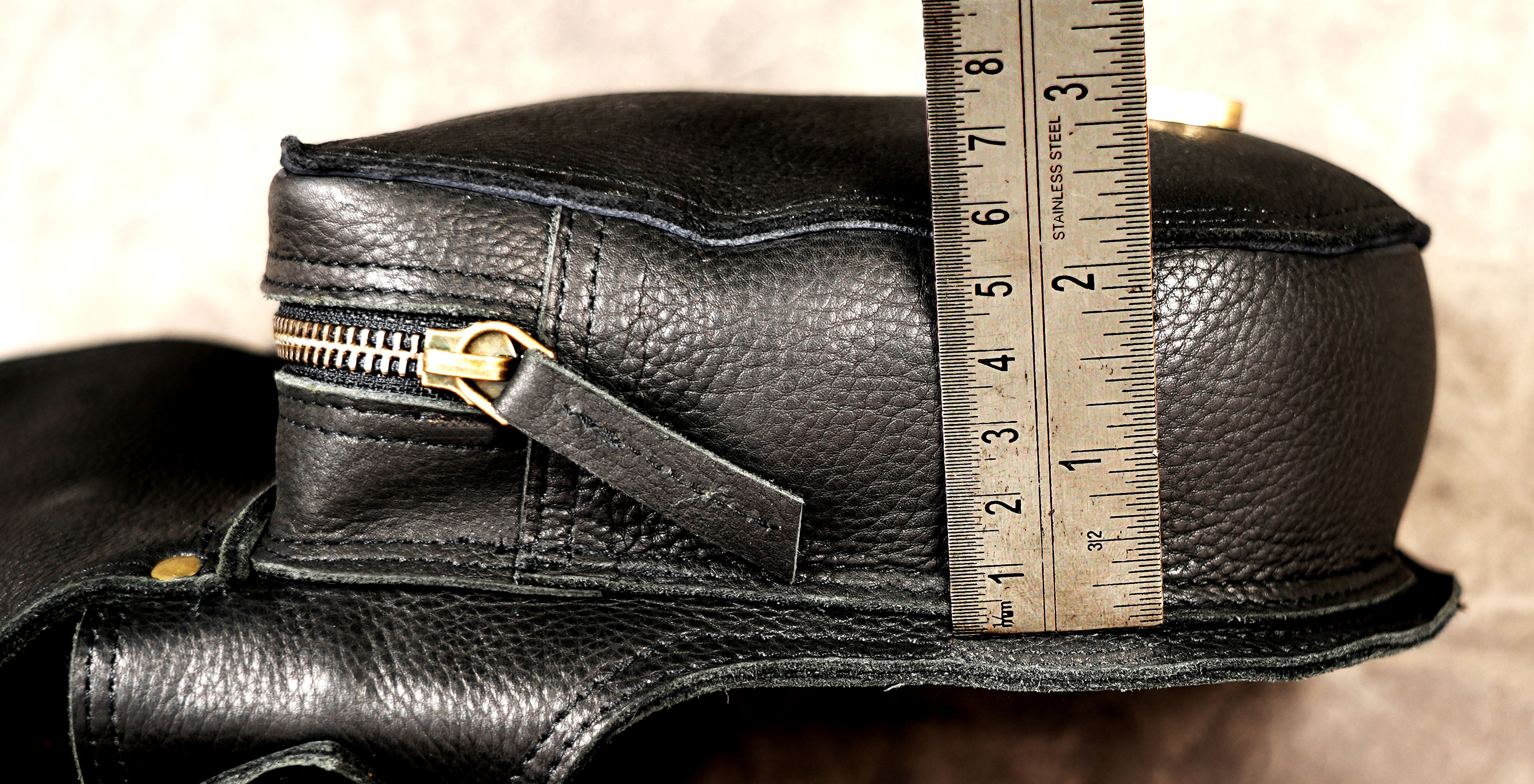 Durable black leather utility pouch for travel and daily essentials