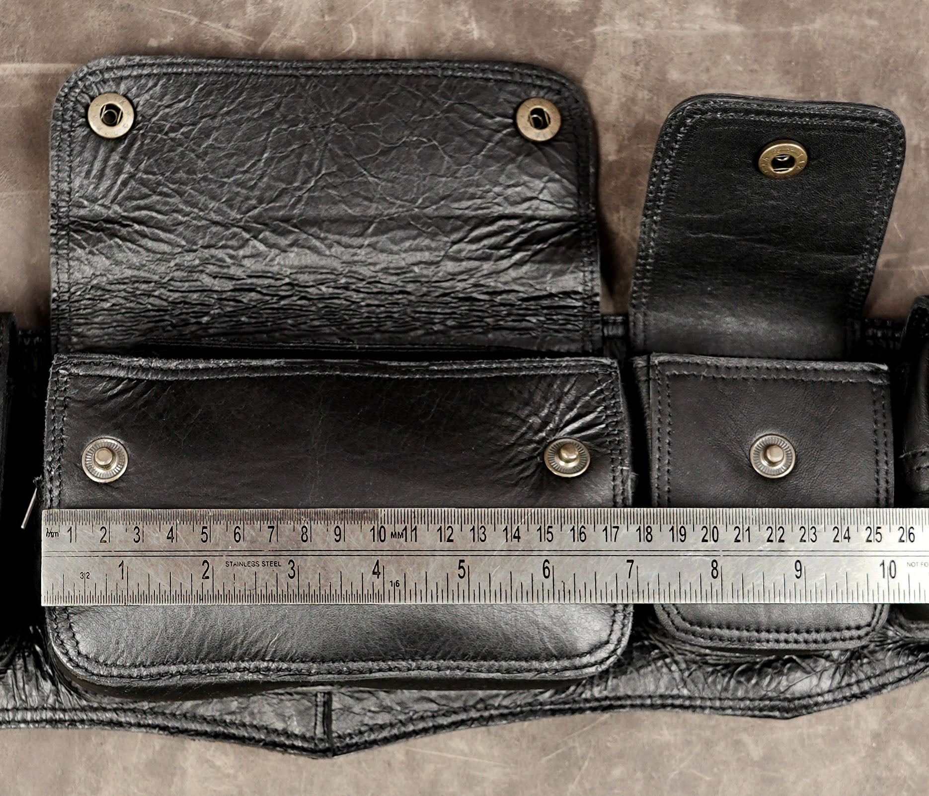 Durable leather work belt with practical storage pouches