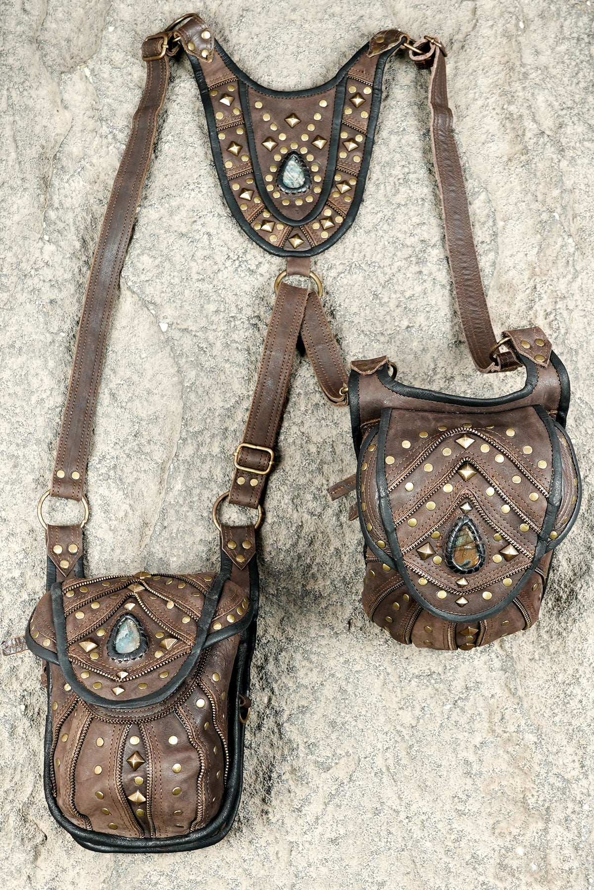 Unisex alternative fashion harness with studded leather pockets and brass-tone buckles