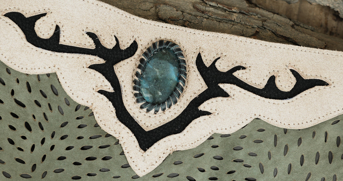 Elven leather mini skirt with laser cut leaf pattern, flat lay