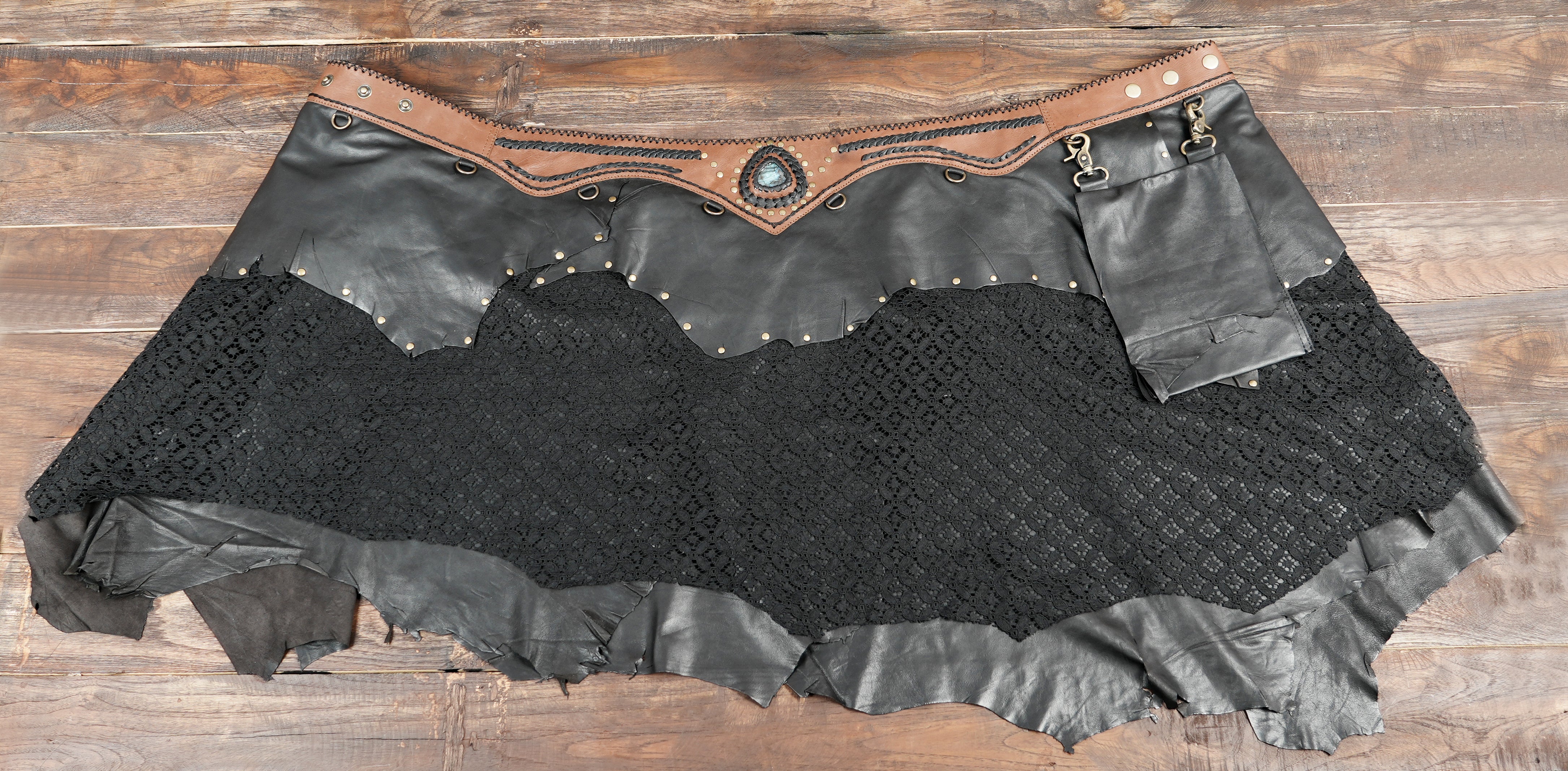 Festival leather skirt with tan tooled waistband and studs
