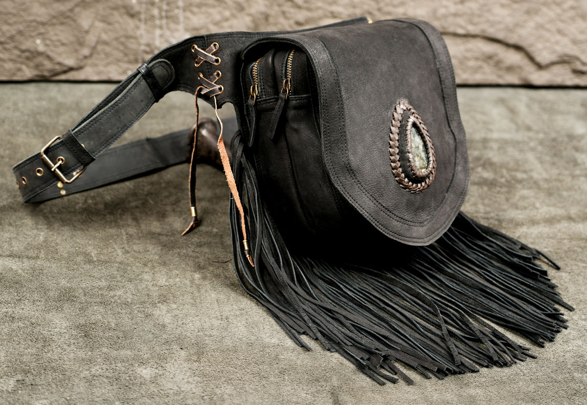 Fringe leather pouch with adjustable belt strap