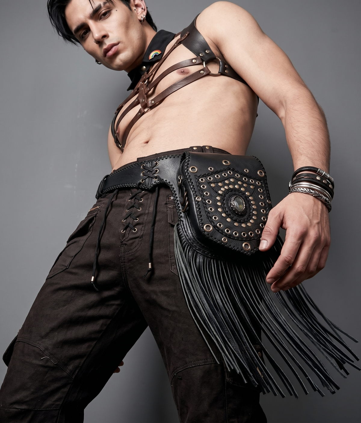 Black leather boho hip pouch with long fringe and stone detail