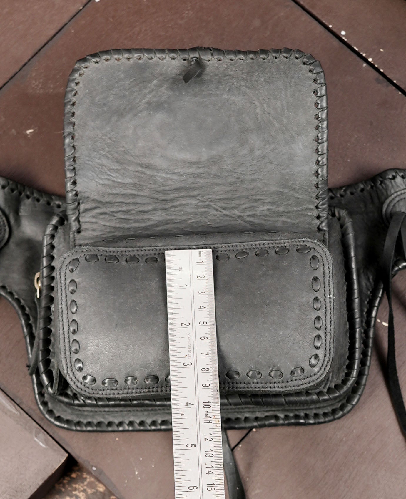 Genuine leather fanny pack with tribal braided stitching detail