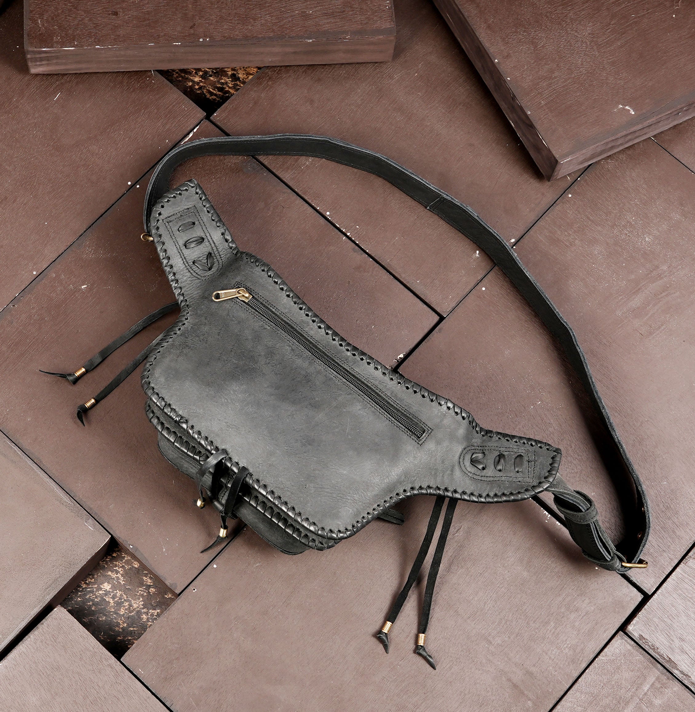 Genuine leather festival bag with whipstitch edge and gemstone