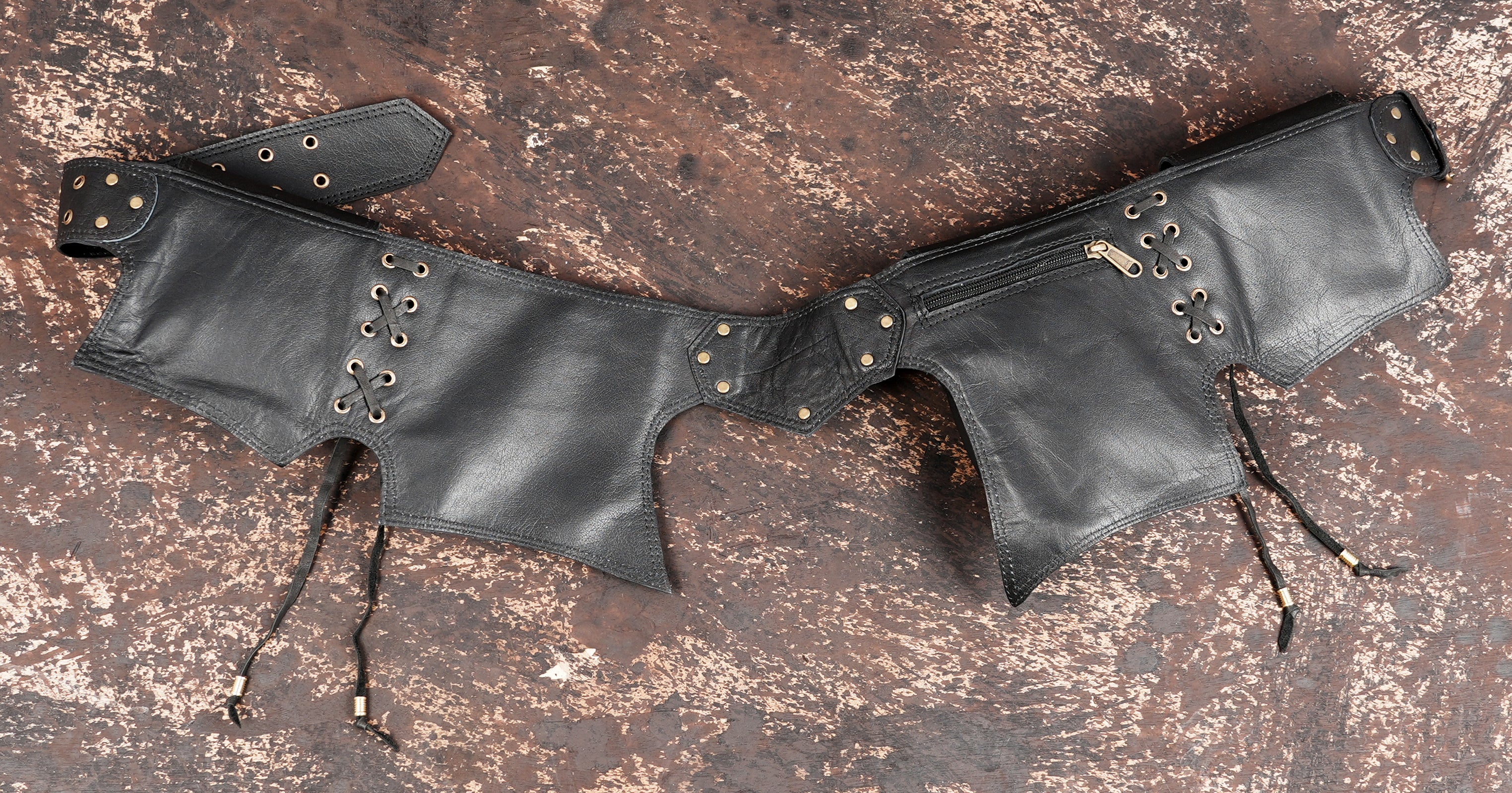 Genuine leather multi pouch belt styled on rustic background