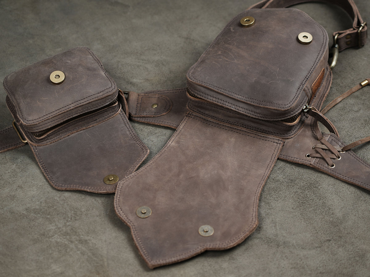 Genuine leather thigh bag with scalloped tooling, close up view