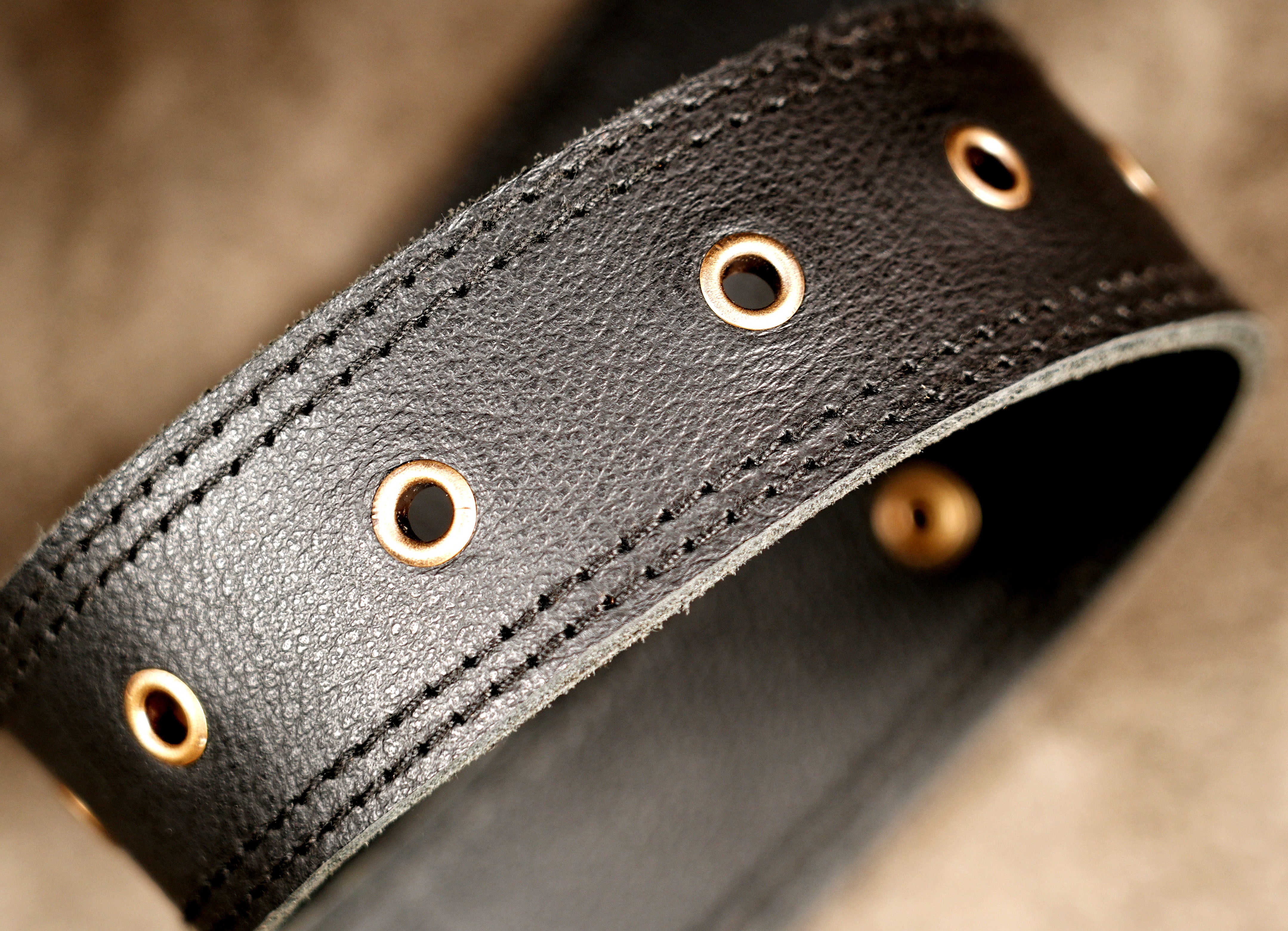 Genuine leather waist bag with hand tooled stone medallion