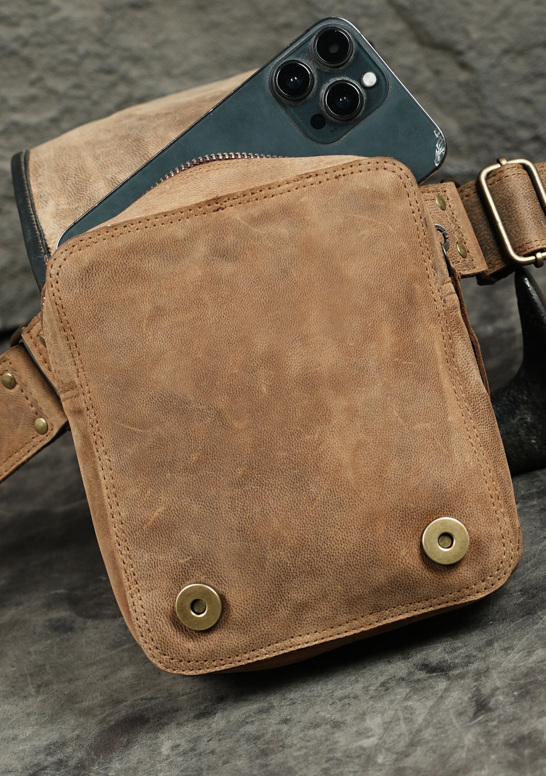 Genuine leather western pouch with studded curved seams