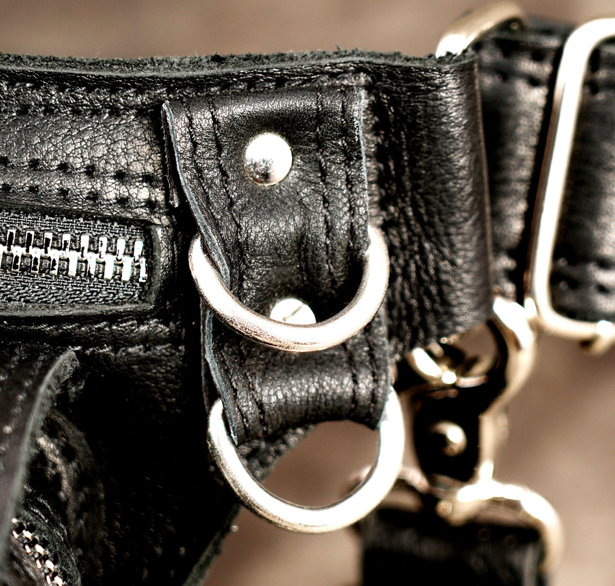 Gothic drop-leg bag with polished silver-colored hardware