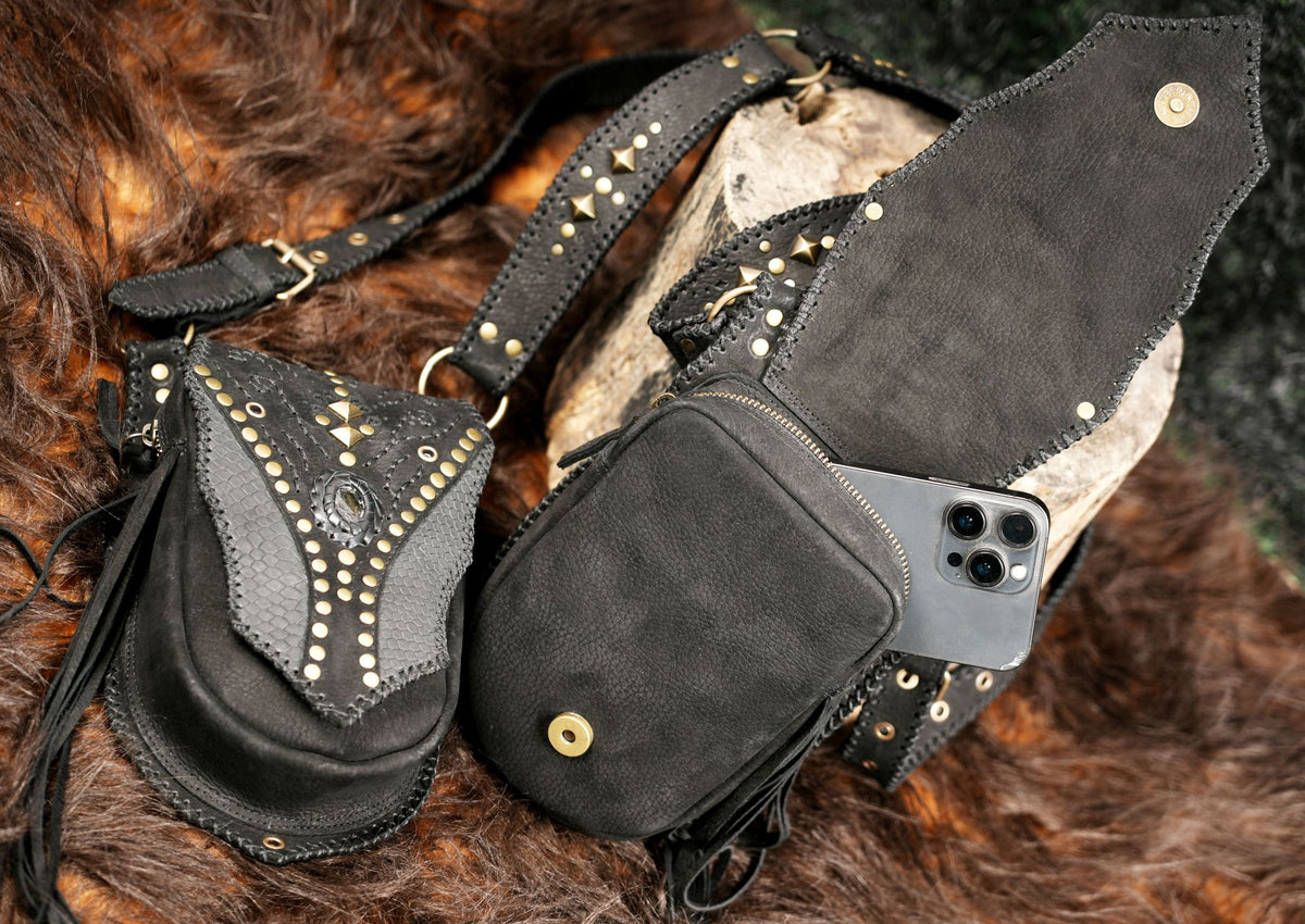 Black leather utility holster set with decorative flap pockets for Burning Man and electronic music festivals.