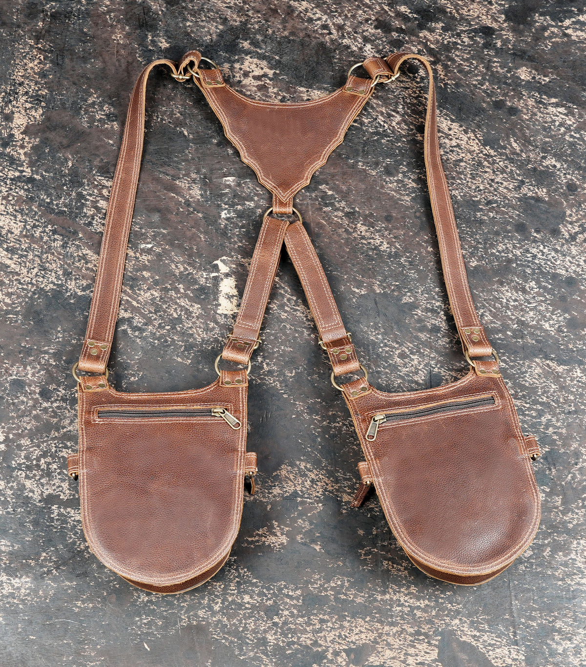 Alternative fashion harness with twin brown pouches and ornate flame detailing