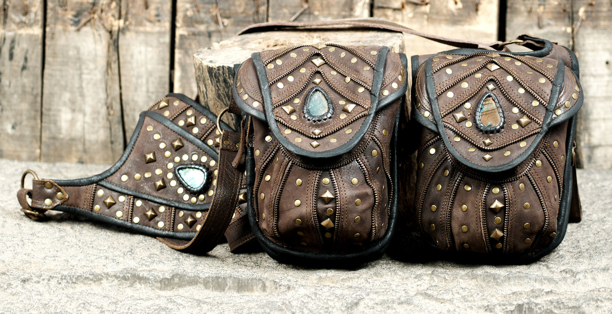 Unisex steampunk leather harness bag set with studded pockets and antique brass buckles