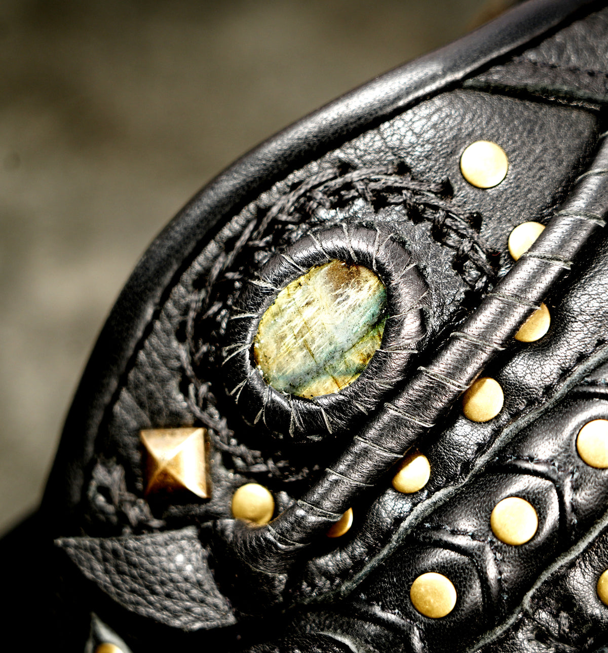 Handmade leather hip belt with multiple pockets and natural stone inlays