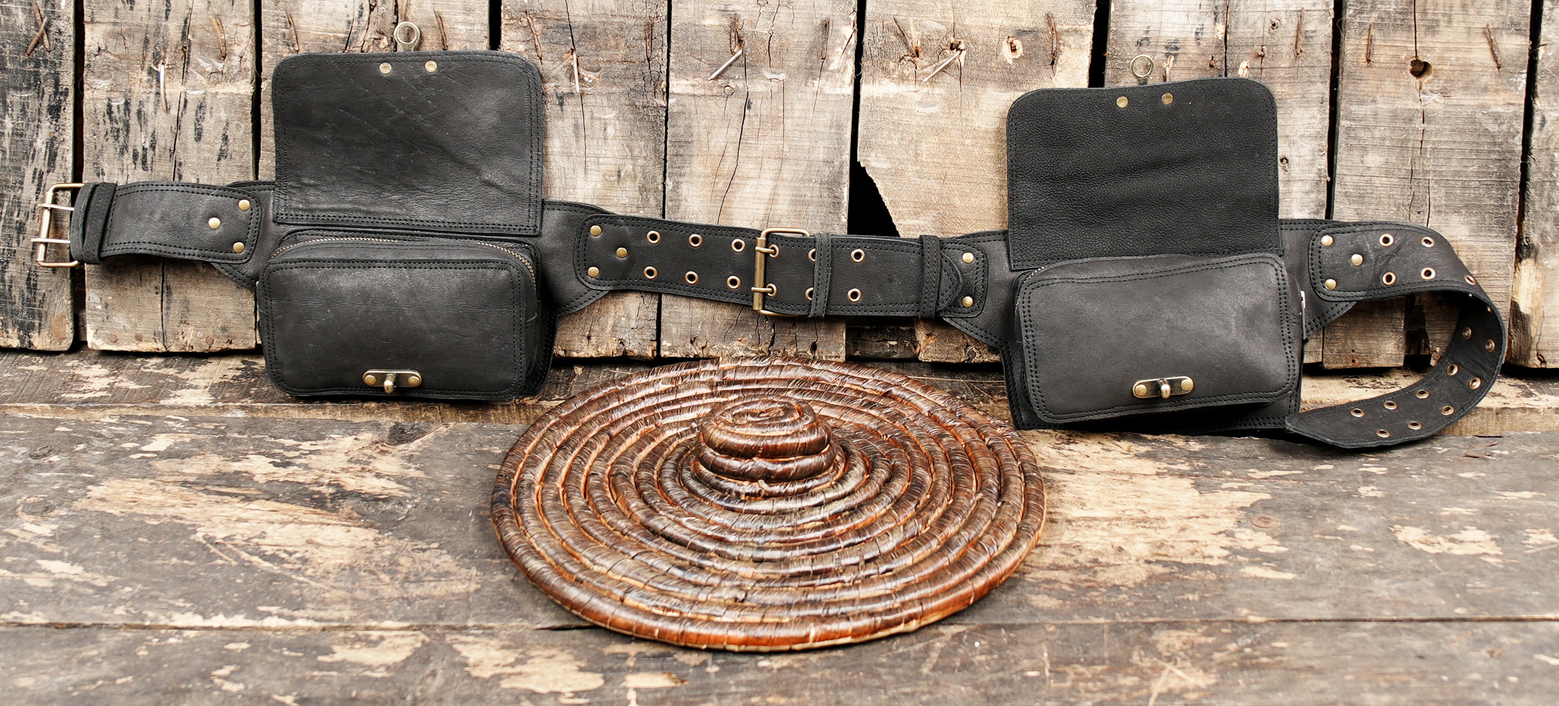Handcrafted leather belt with twist lock pouches on each side