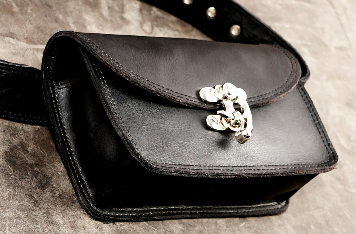 Handcrafted leather fanny pack with clean rounded shape