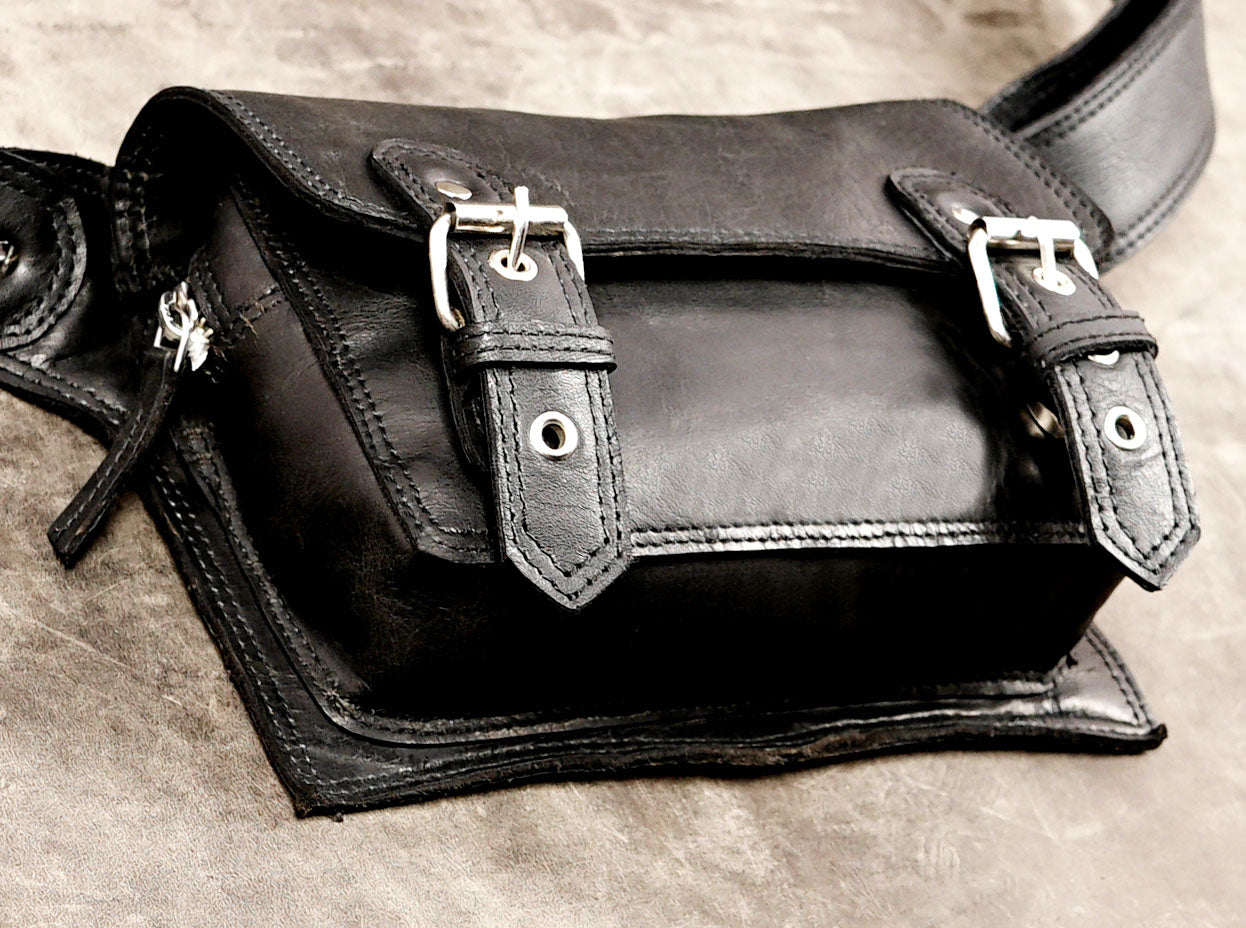Handcrafted leather fanny pack with front buckle straps