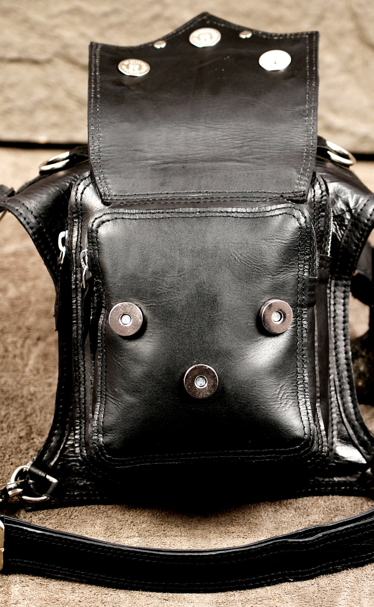 Handcrafted leather leg bag with adjustable strap