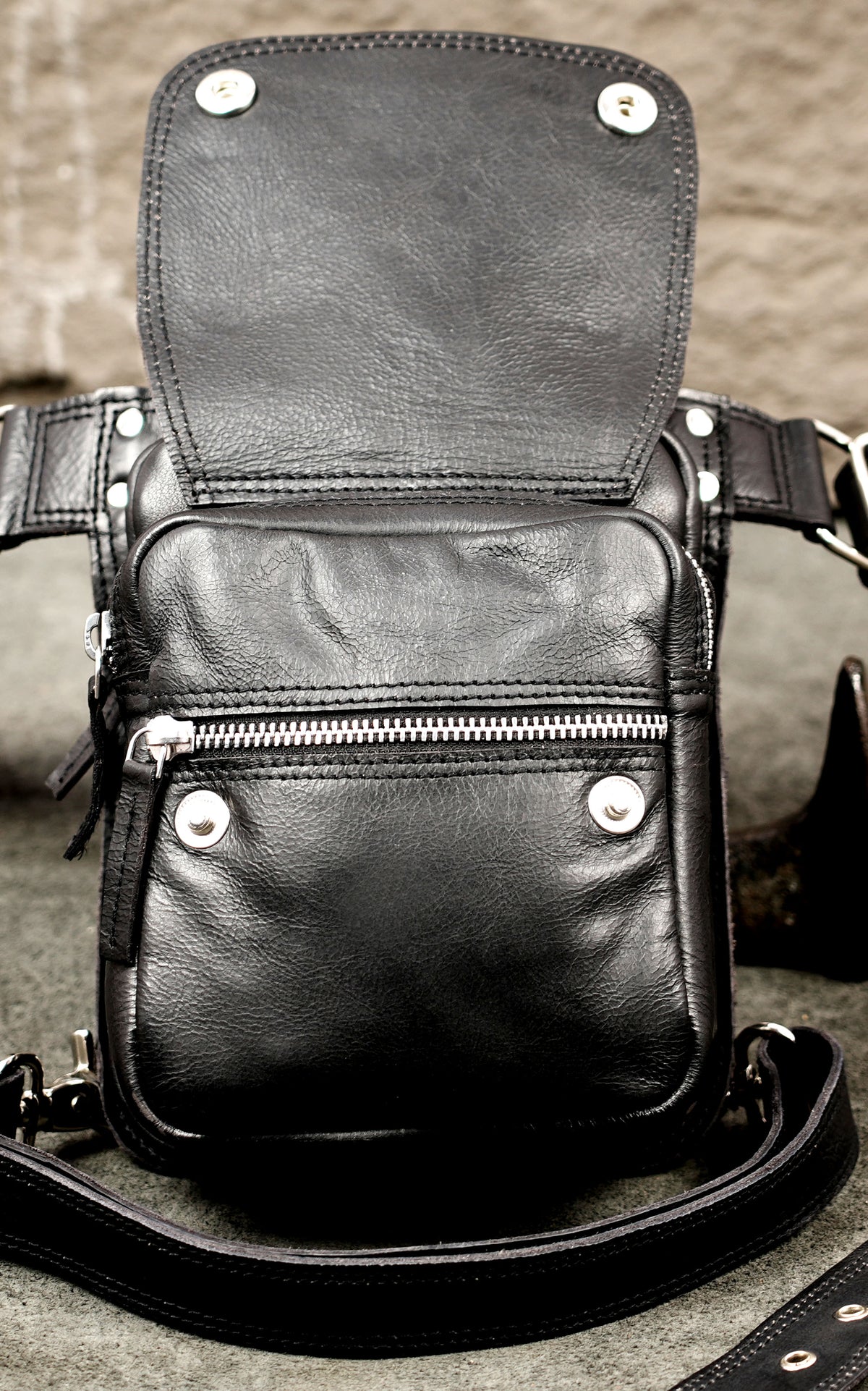 Handcrafted leather leg bag with adjustable strap