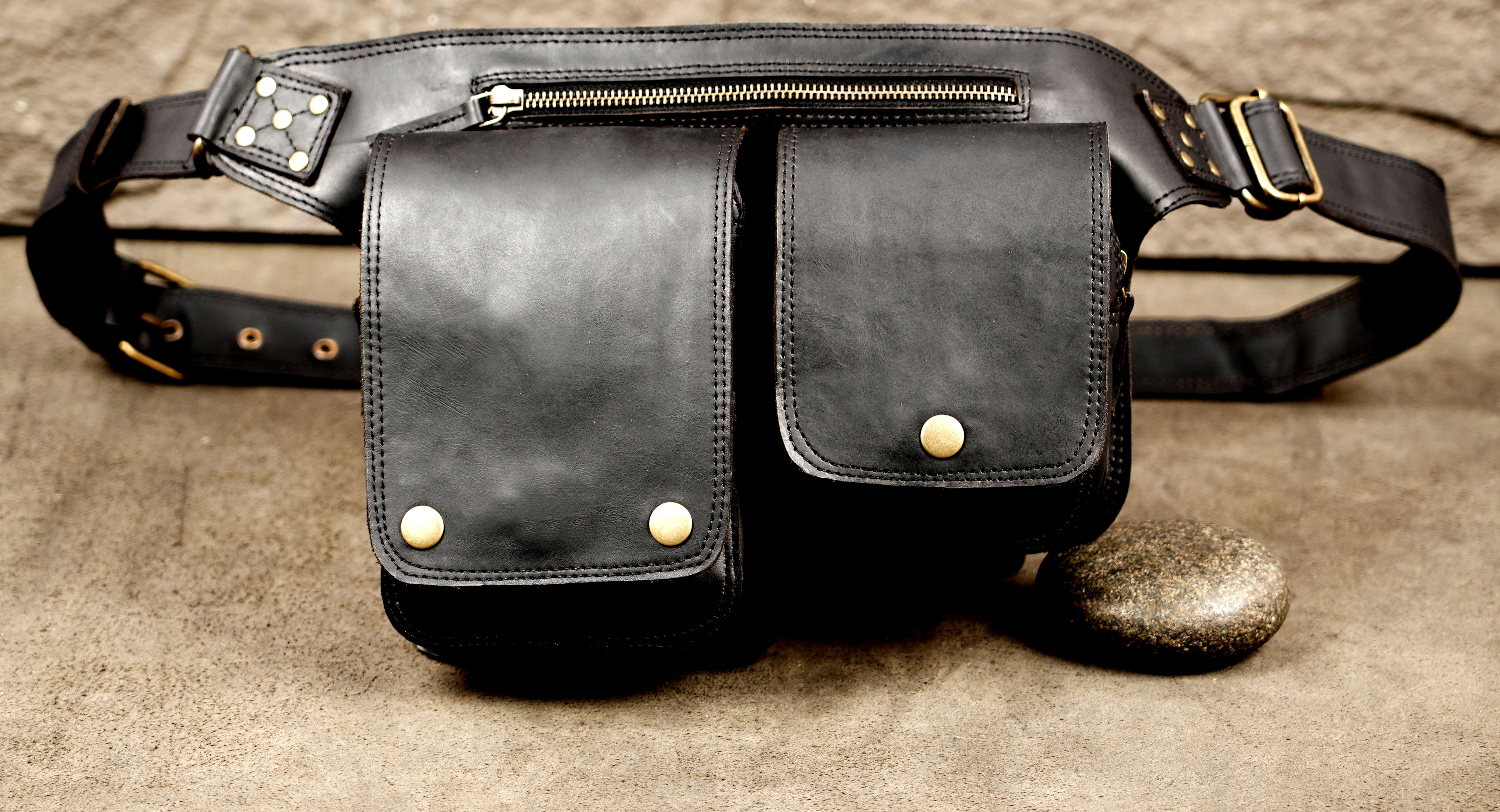 Handcrafted leather utility bag with two snap closures