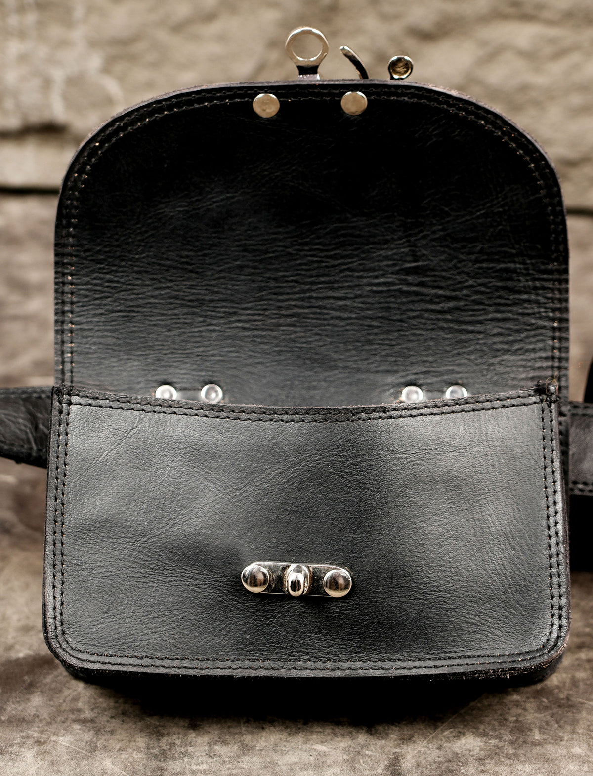 Handcrafted leather waist bag with adjustable long strap