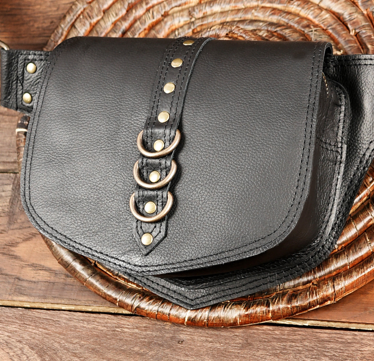 Handcrafted leather waist bag with multiple pockets