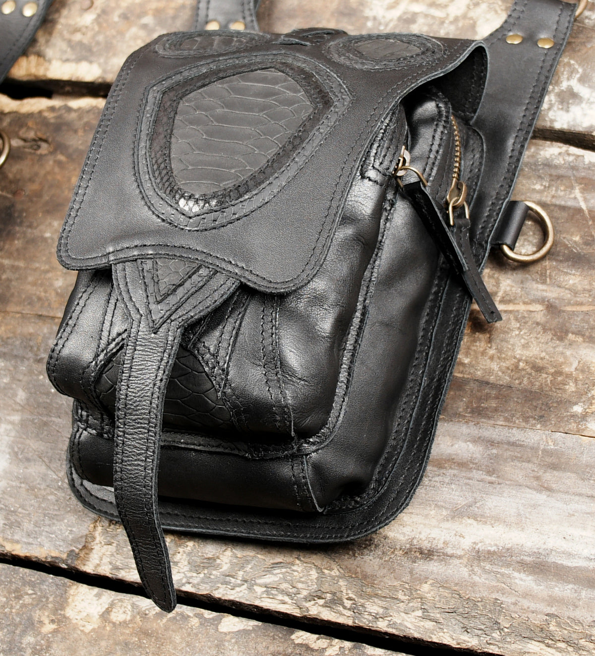 Handmade leather double pouch bag for music festivals, concerts, and outdoor events