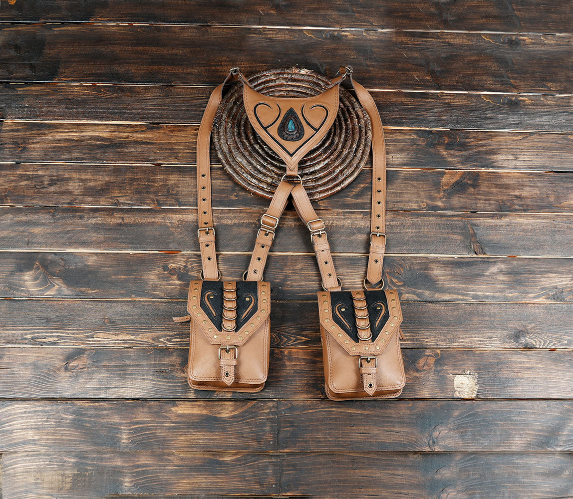 Tan leather shoulder harness bag set with gemstone detail and studded pockets