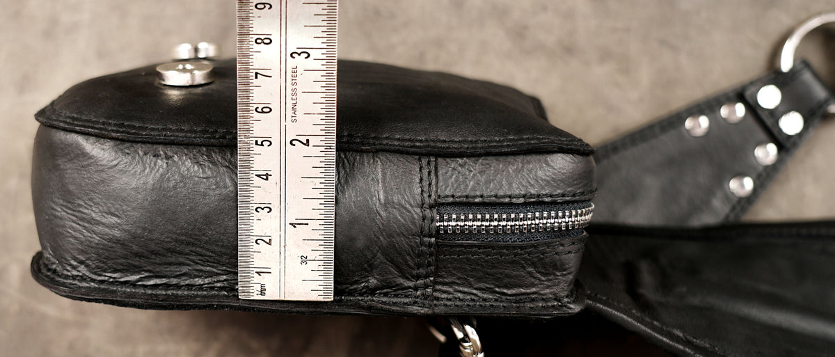 Handmade black leather hip bag with crystal stone details
