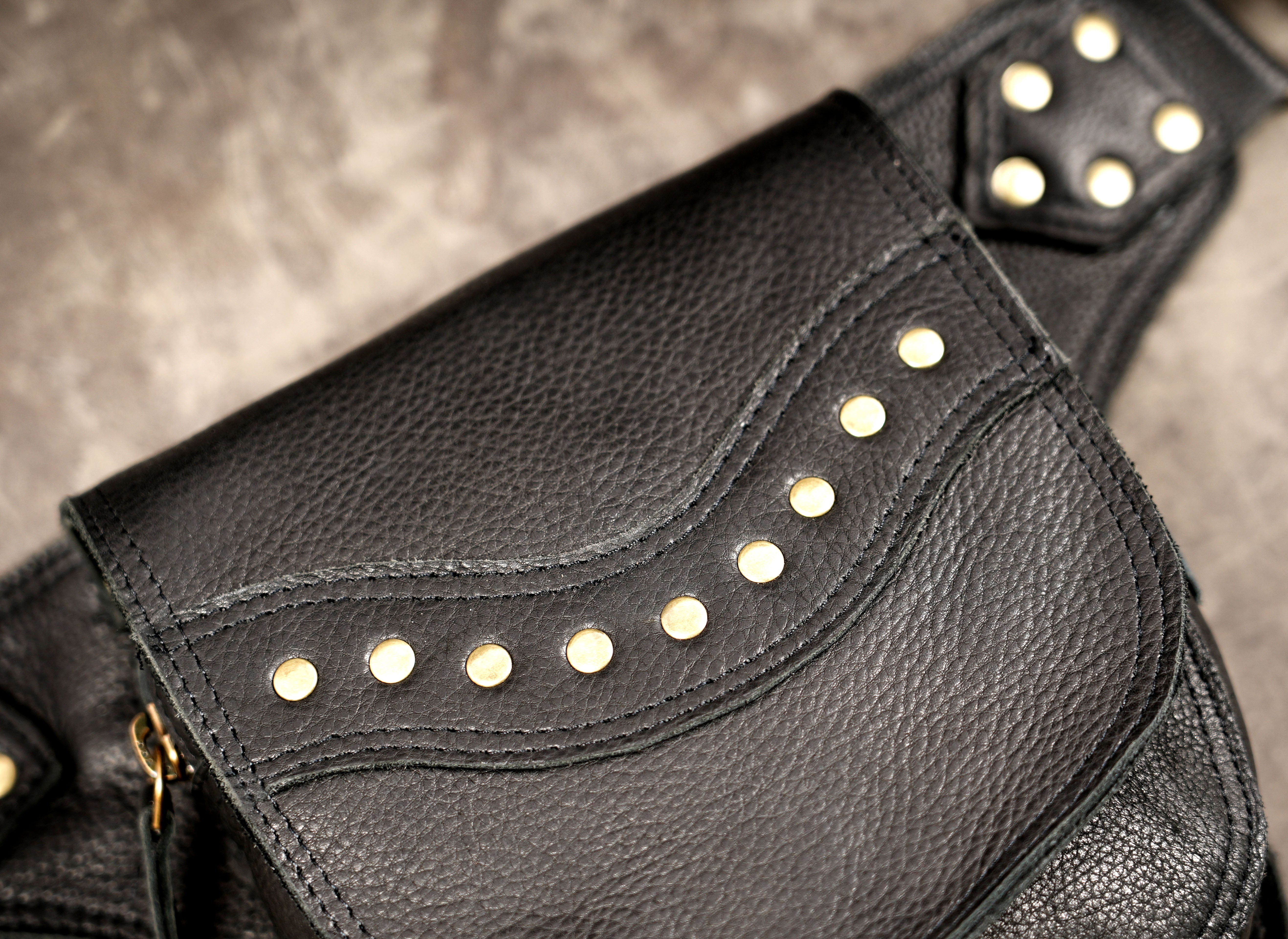 Handmade black leather utility waist bag with secure flap pocket