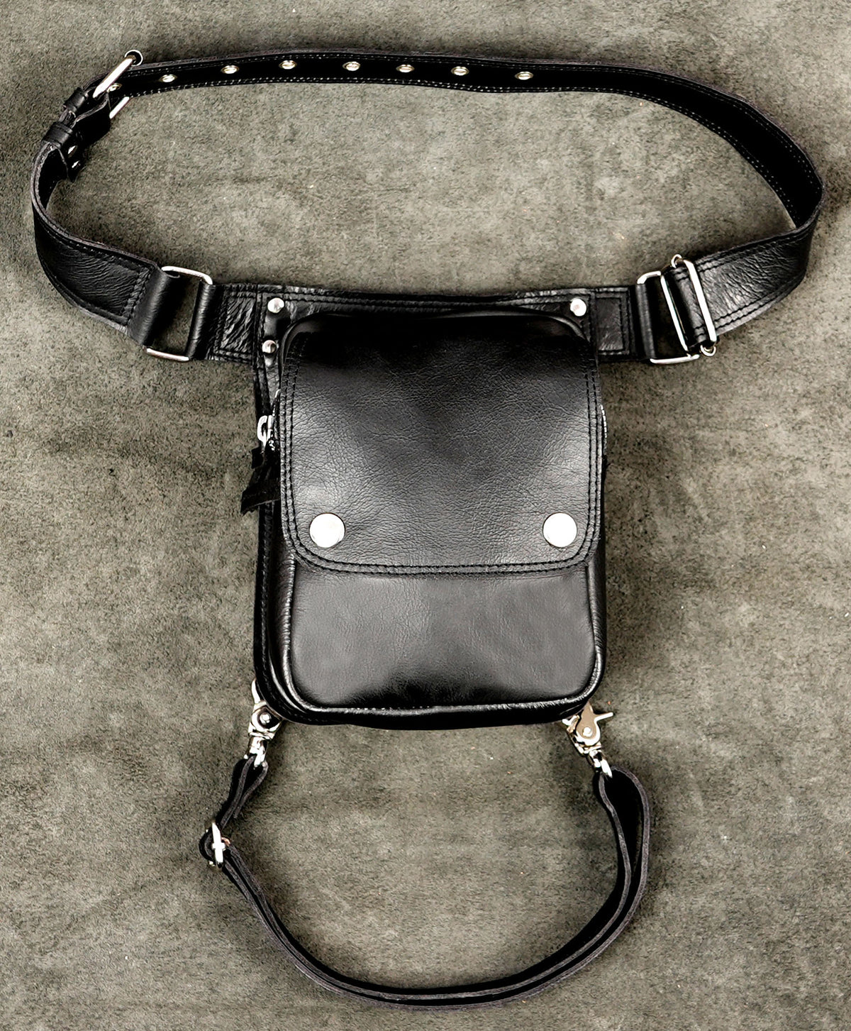 Handmade black leather waist and thigh bag with snap pocket