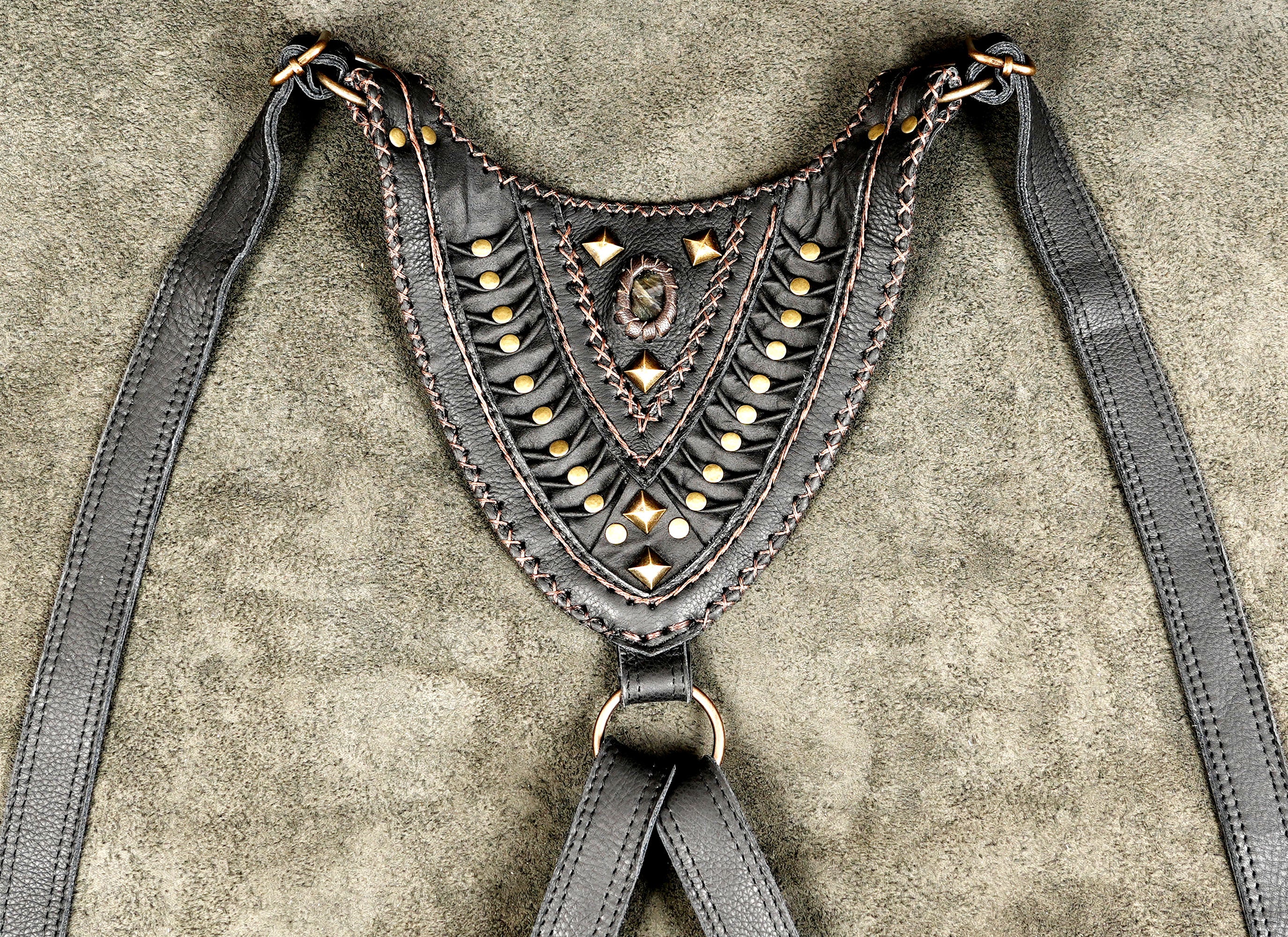 Handmade leather body harness featuring two spacious storage pouches