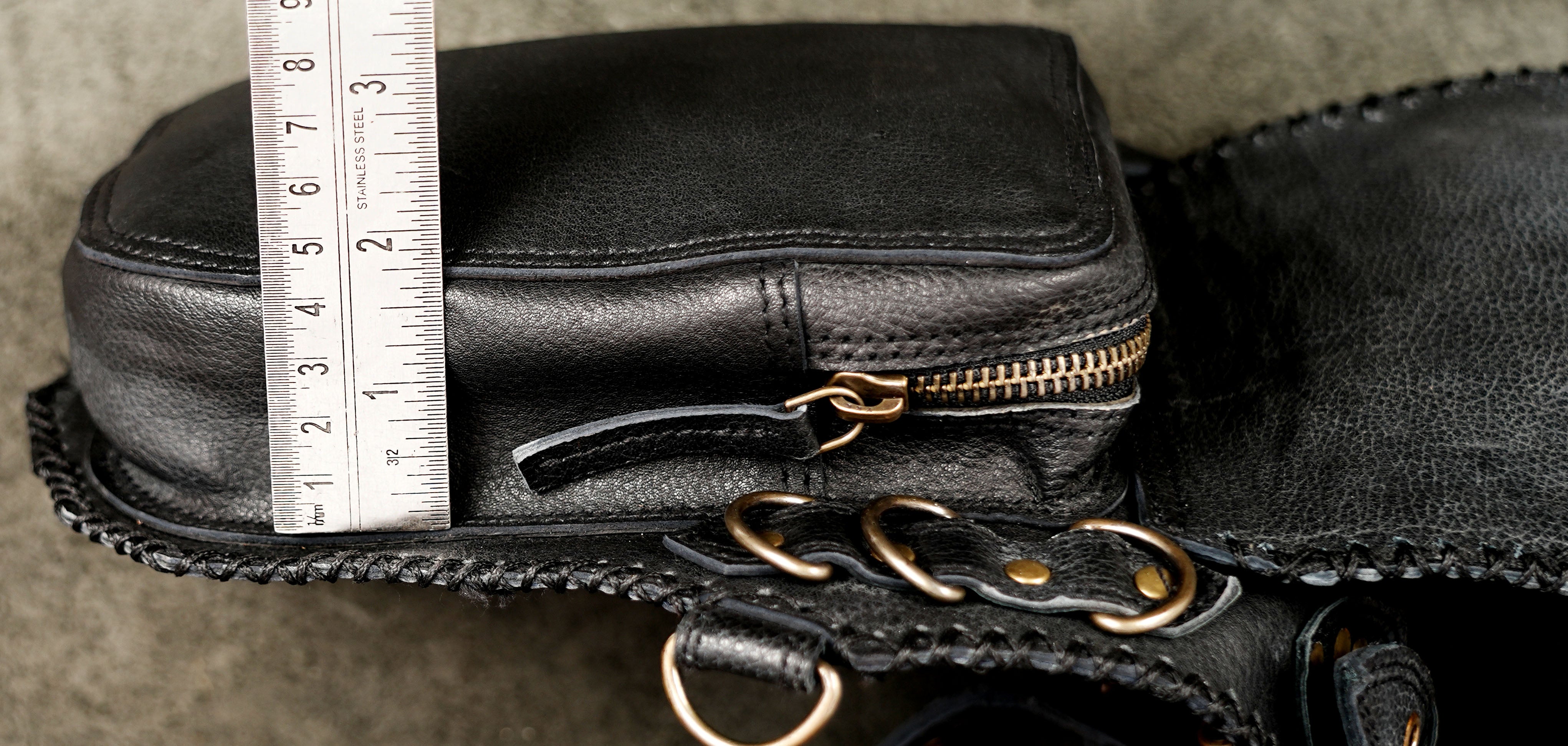 Handmade leather cosplay holster with geometric stitch pattern