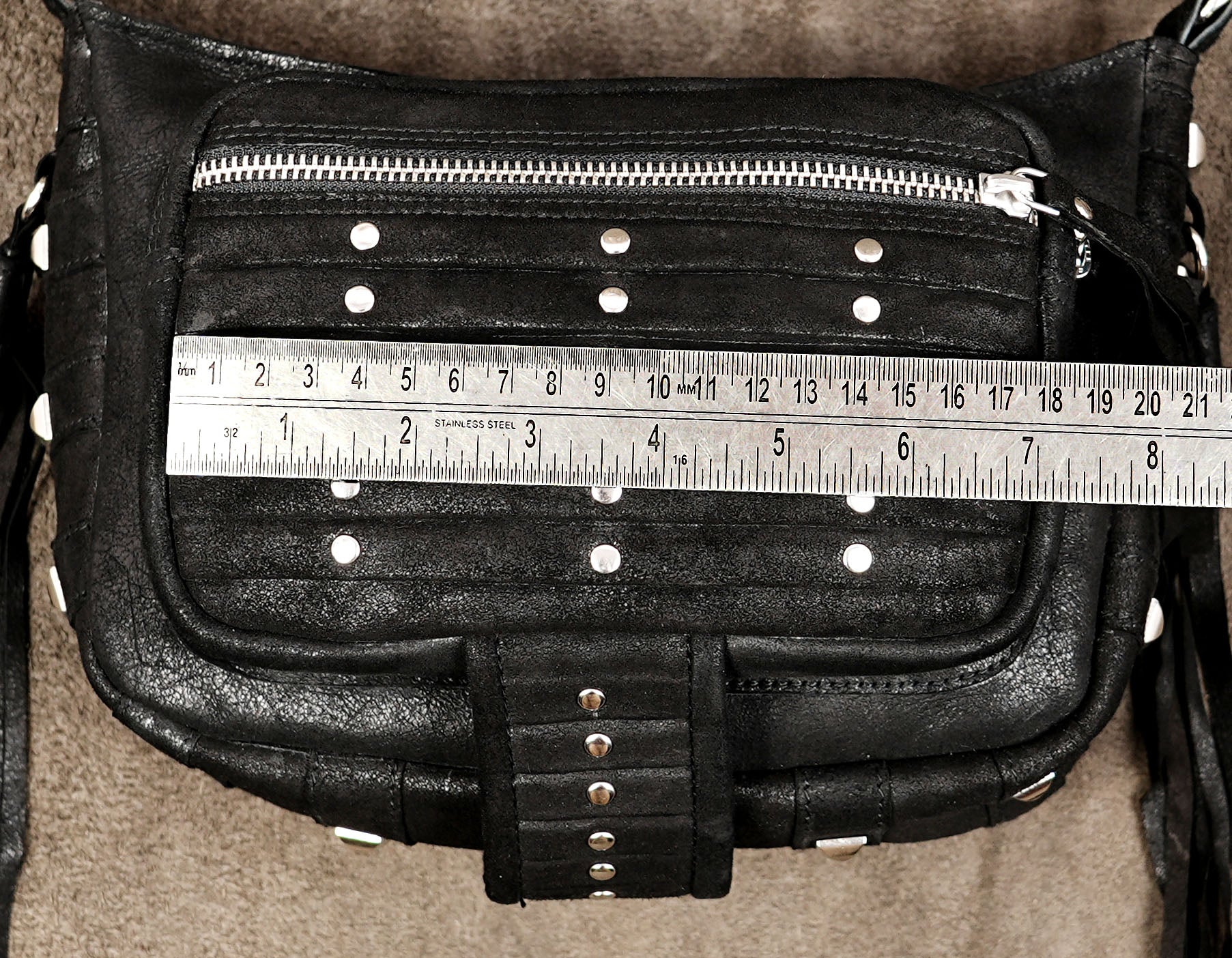 Handmade leather festival bag with silver stud design